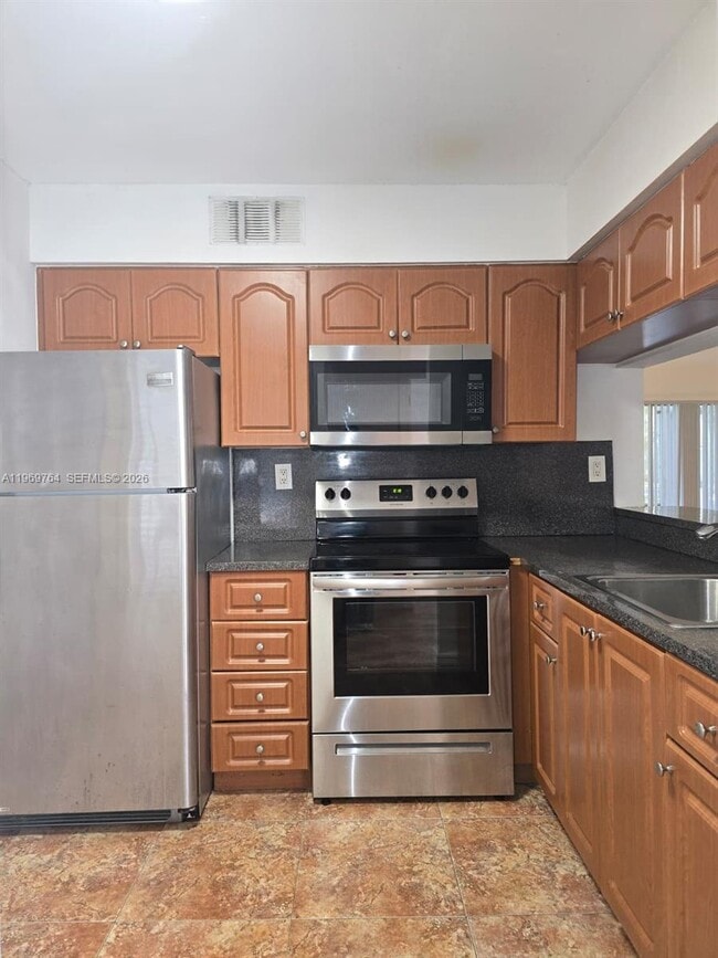 9501 SW 138th Pl in Miami, FL - Building Photo - Building Photo