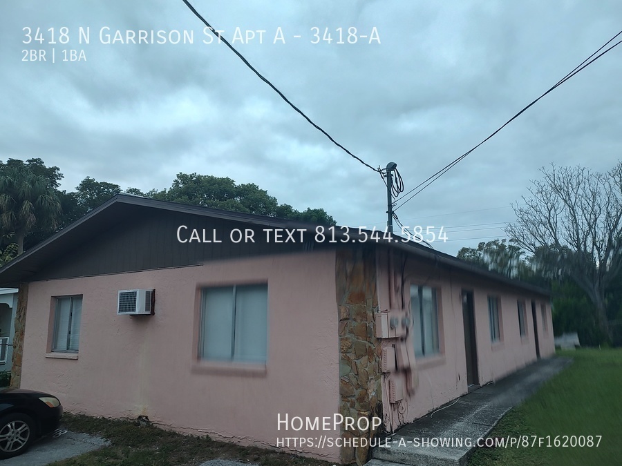 3418 N Garrison St in Tampa, FL - Building Photo