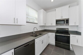 7728 Stone Crk Trl in Kissimmee, FL - Building Photo - Building Photo