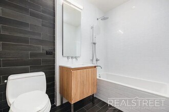 Stunning, Elegant, 2 Bedroom Right off Lorimer L train, Amazing Roof deck, Gym, Great Location! in Brooklyn, NY - Building Photo - Building Photo