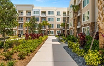 Osprey Park 62+ Apartments & Cottages in Kissimmee, FL - Building Photo - Building Photo