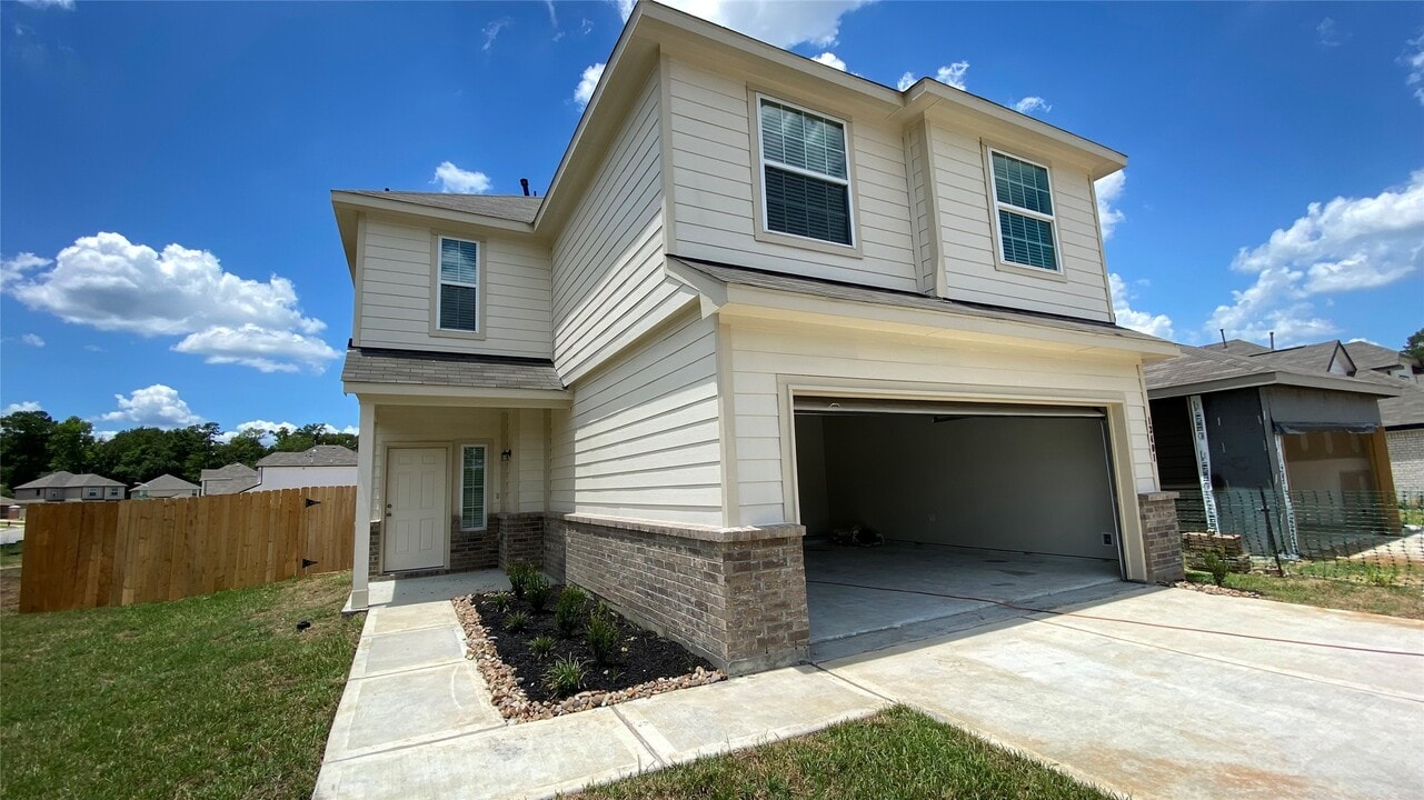 13401 Cannon Crk Ct in Willis, TX - Building Photo