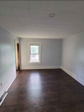 115 W Pulteney St, Unit 201 in Corning, NY - Building Photo - Building Photo