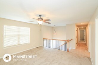 409 Wiltshire Dr in Raymore, MO - Building Photo - Building Photo