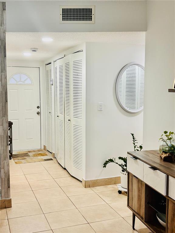 8350 Sands Point Blvd, Unit 104E in Tamarac, FL - Building Photo - Building Photo