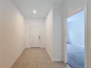 418 Quayside Ave in Mascotte, FL - Building Photo - Building Photo