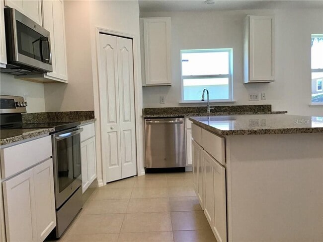 15514 Gemini Dr in Mascotte, FL - Building Photo - Building Photo