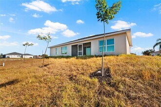 3078 NW 4th Pl in Cape Coral, FL - Building Photo - Building Photo