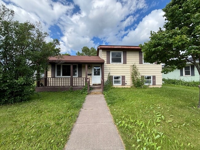 property at 205 E 3rd St