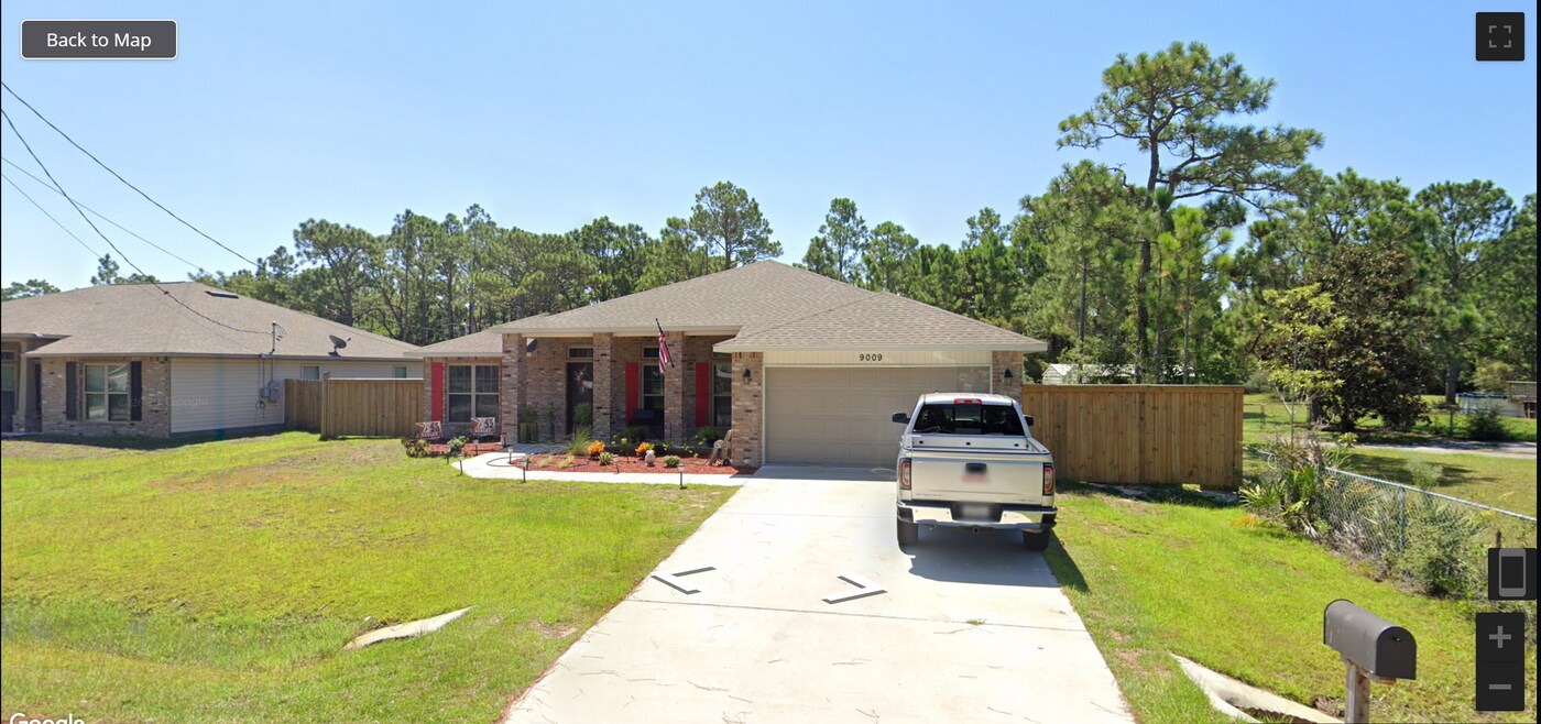 9009 Quail Roost Dr in Navarre, FL - Building Photo