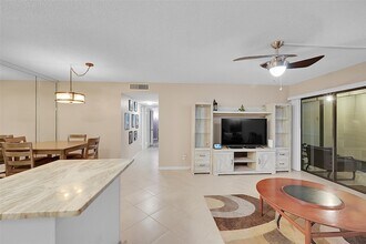 9369 S Belfort Cir, Unit 114 in Tamarac, FL - Building Photo - Building Photo