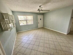 7070 Golf Colony Ct in Greenacres, FL - Building Photo - Building Photo