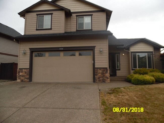 property at 1116 SE Millright Ave