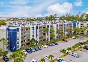 10090 NW 80th Ct, Unit 1555 in Hialeah Gardens, FL - Building Photo