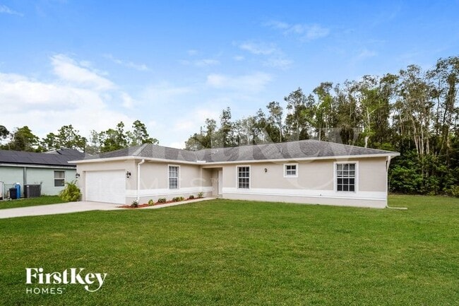 1015 Jessup Ave in Lehigh Acres, FL - Foto de edificio - Building Photo