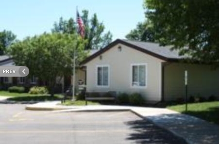 Village Green Apartments in Byron, IL - Building Photo