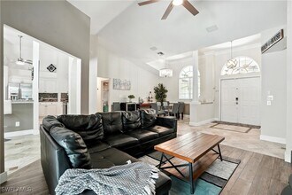 5891 Golden Oaks Ln in Naples, FL - Building Photo - Building Photo