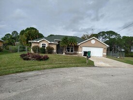 6444 NW Hacienda Ct in Port St. Lucie, FL - Building Photo
