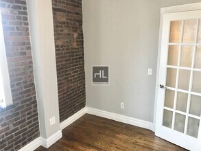 PERRY ST., Unit 2 in New York, NY - Building Photo - Building Photo