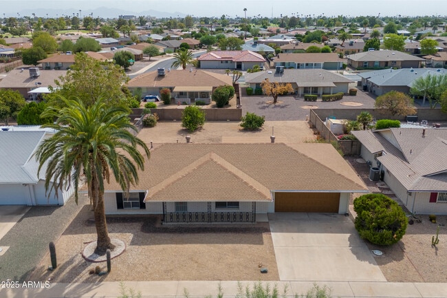 property at 10301 W Charter Oak Dr