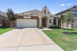562 Leadtree Loop in Mustang Ridge, TX - Building Photo - Building Photo
