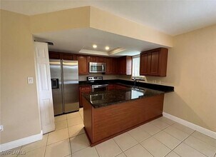 1350 Green Valley Cir in Naples, FL - Foto de edificio - Building Photo