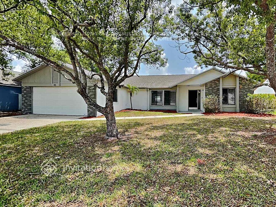 11841 Whispering Tree Ave in Orlando, FL - Building Photo