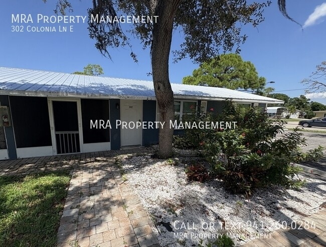 property at 302 Colonia Ln E