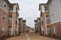 Apartment Exterior - Woodland Park at the Grove Apartments in Rogers, Arkansas