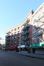 33-37 Mott St in New York, NY - Building Photo - Building Photo