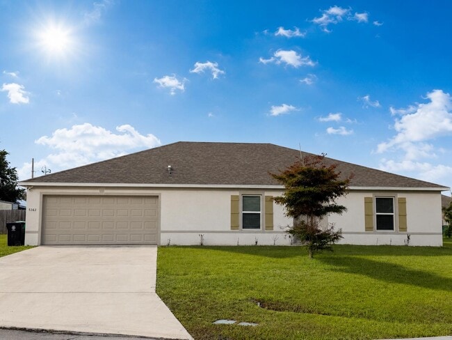 property at 5363 NW Perez Ct