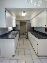 1936 Spanish Oaks Dr S in Palm Harbor, FL - Building Photo - Building Photo