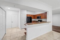 10009 Villagio Gardens Ln in Estero, FL - Foto de edificio - Building Photo