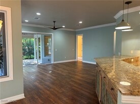 4956 Rustic Oaks Cir in Naples, FL - Building Photo