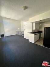 1242 S Holt Ave in Los Angeles, CA - Building Photo - Building Photo