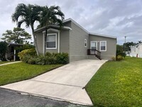 6119 N Guava Ln in Atlantis, FL - Building Photo - Building Photo