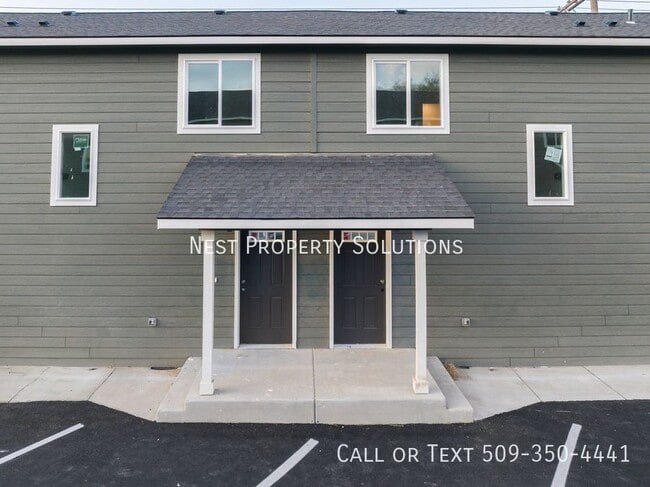 property at 215 W 1st St