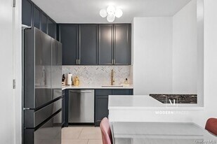 4-74-74 48th Ave, Unit 21-E in Queens, NY - Building Photo
