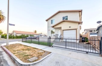 154 E 94th St in Los Angeles, CA - Foto de edificio - Building Photo