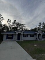 9094 N Peachtree Way in Citrus Springs, FL - Building Photo
