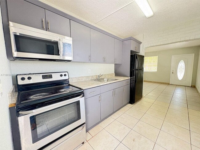 property at 2443 NW 7th St