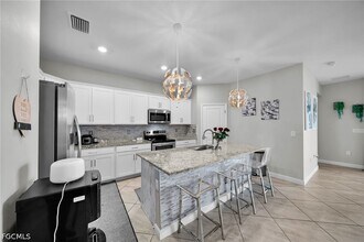 13846 Pine Lodge Ln in Ft. Myers, FL - Building Photo - Building Photo