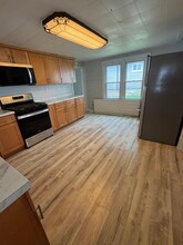 24 NW 9th St in Oswego, NY - Building Photo - Building Photo