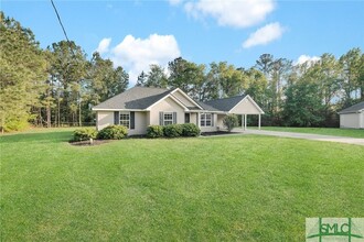 396 Abbey Dr in Richmond Hill, GA - Building Photo - Building Photo