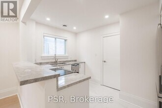 25 Coulson Ave in Toronto, ON - Building Photo - Building Photo