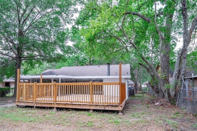 property at 9214 Woodland Oaks Dr