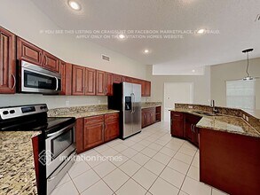 1053 Wild Cherry Ln in Wellington, FL - Building Photo - Building Photo