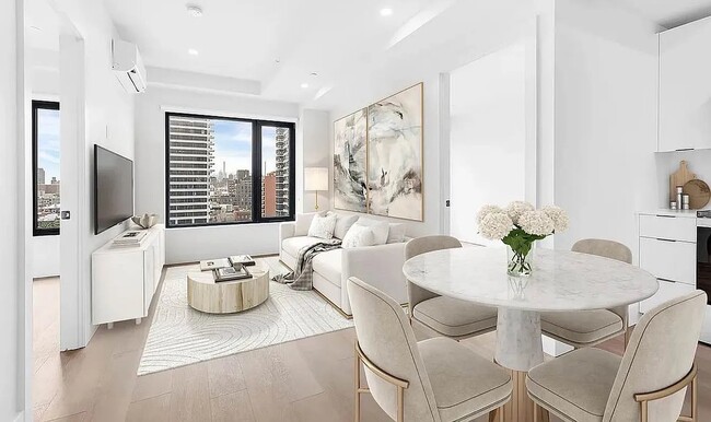 property at 215 E 124th St