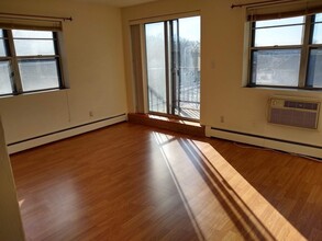 4925 Washington St, Unit 406 in Boston, MA - Building Photo - Building Photo