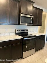 3469 Burrowing Owl Dr in Mims, FL - Building Photo - Building Photo